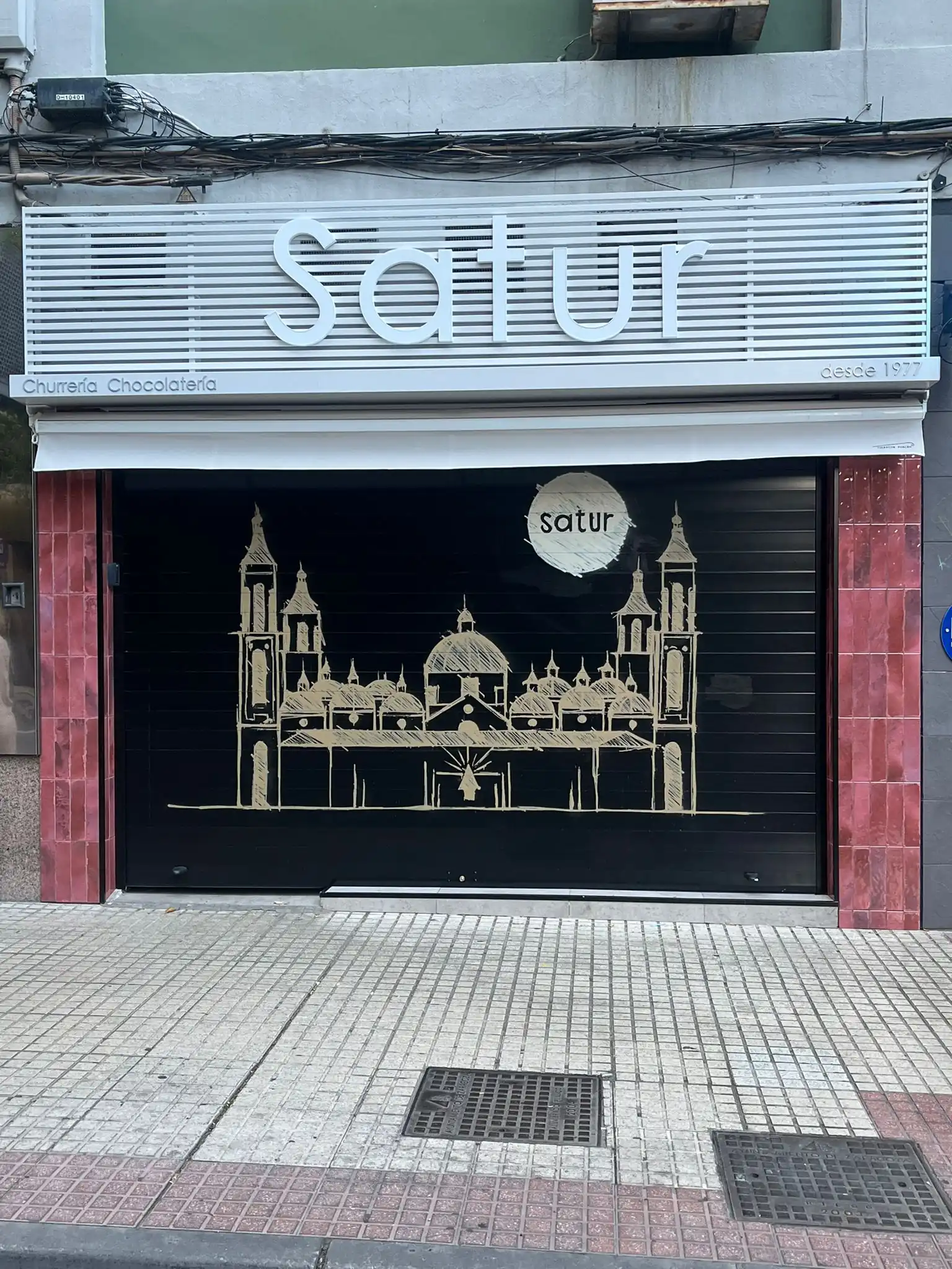 Graffiti personalizado para churrería y chocolatería satur en Zaragoza